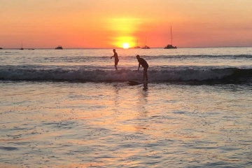 Learning-to-surf-at-sunset