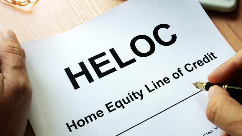 Large sign that says HELOC and underneath Home Equity Line of Credit