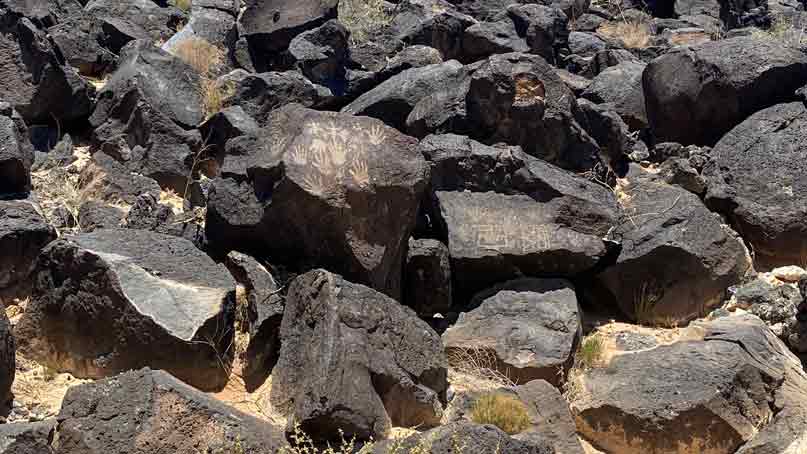 volcanic rocks with carved images