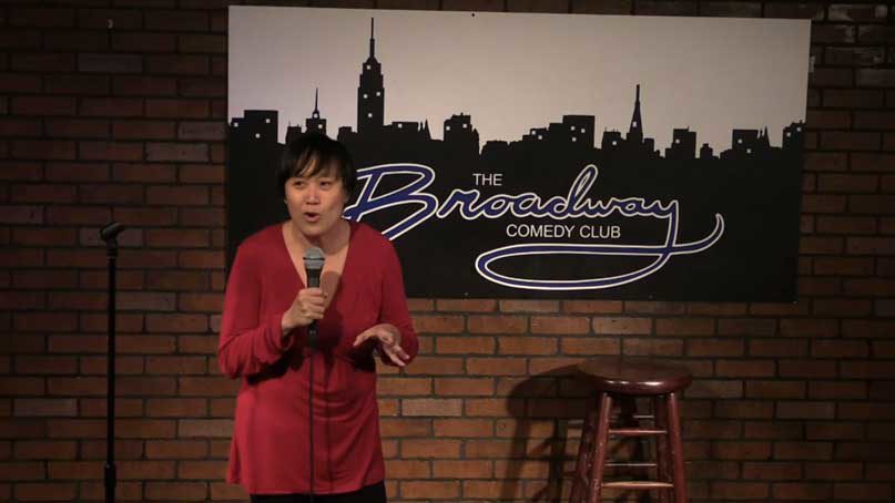 Caroline performing comedy at Broadway Comedy Club in New York City