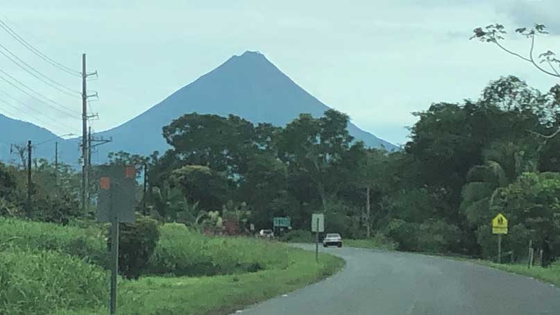 view of arenal volcano in the distance