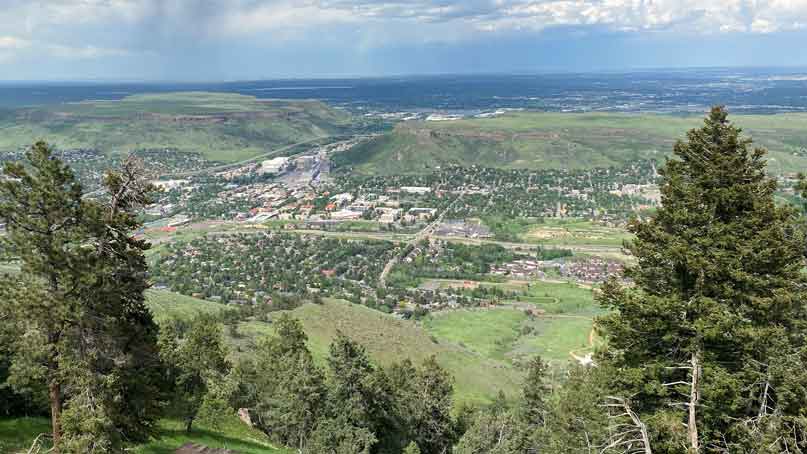 view from mountain top of small city below