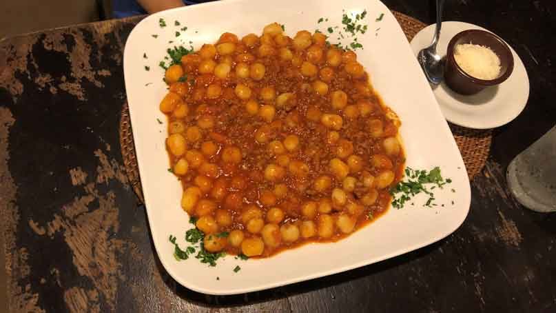 plate of gnocchi with bolognese  sauce