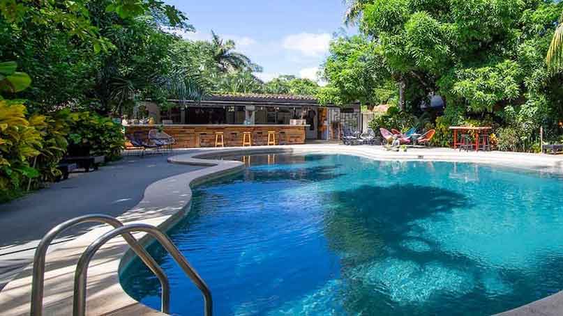 large pool with building in a background