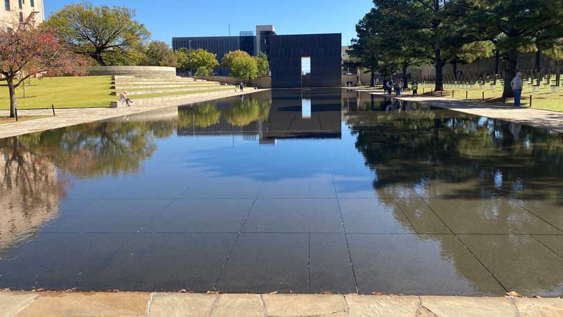 reflecting pool with monument in the distance