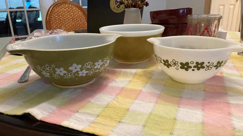 3 bowls with designs on a table