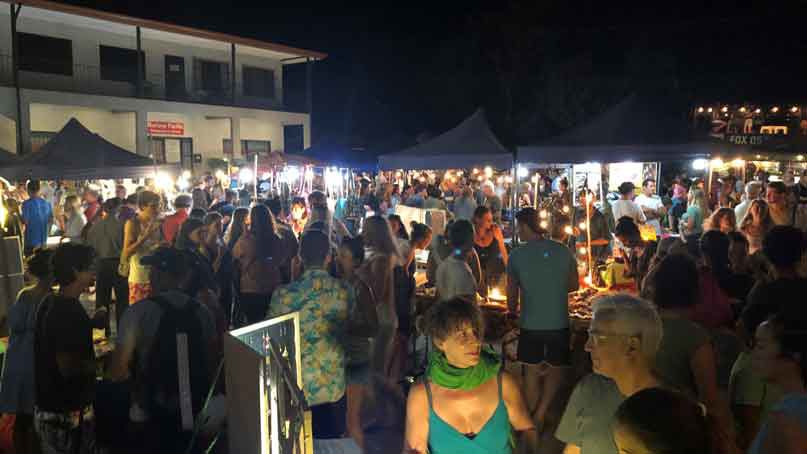 Tamarindo night market has lots of shops and food stands and people